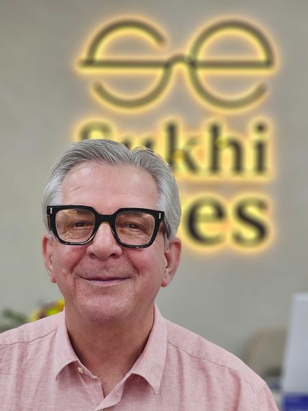 Guest in bold black square frames
